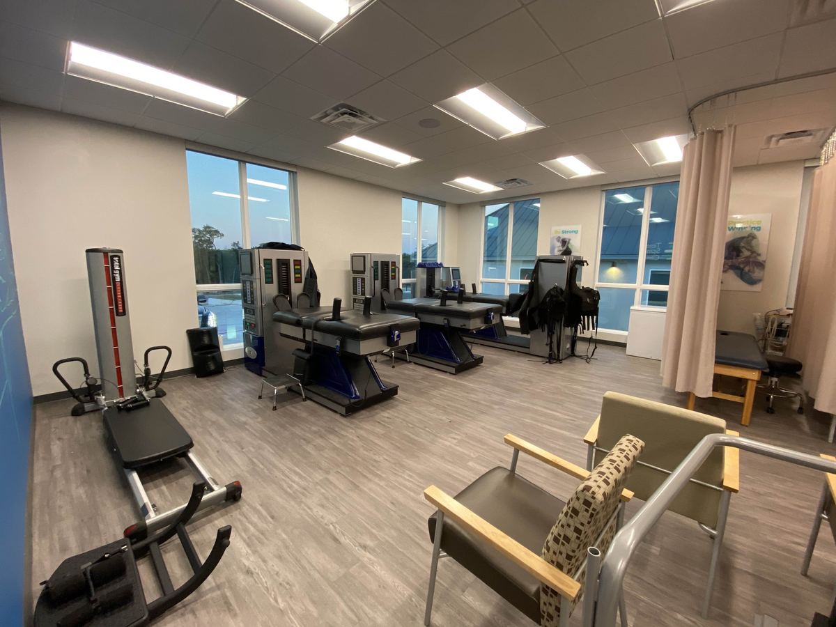 The DRX9000 spinal decompression tables in the Texas Spine Clinic treatment room.