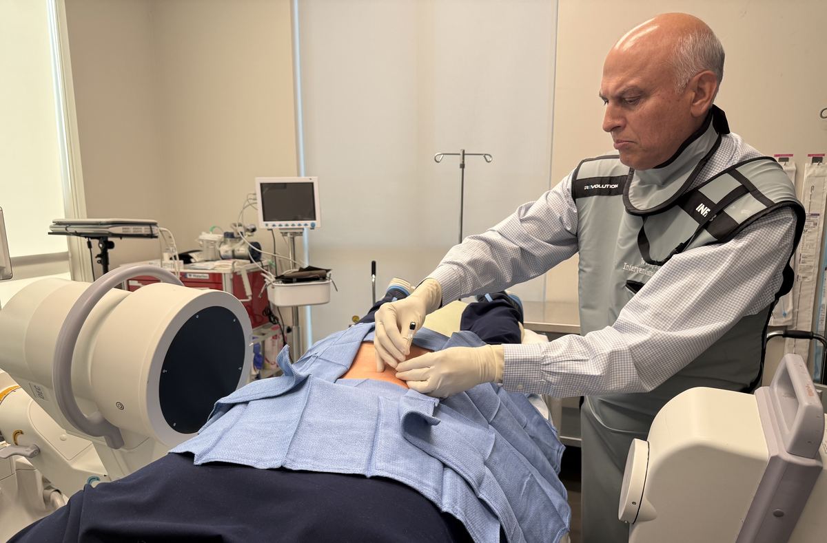 Praful C. Singh, M.D., performing an image-guided spinal injection at Texas Spine Clinic.