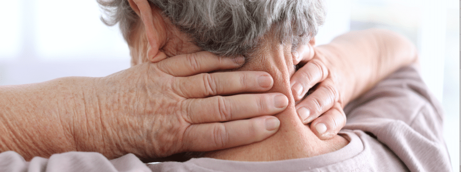 An older man feels neck pain